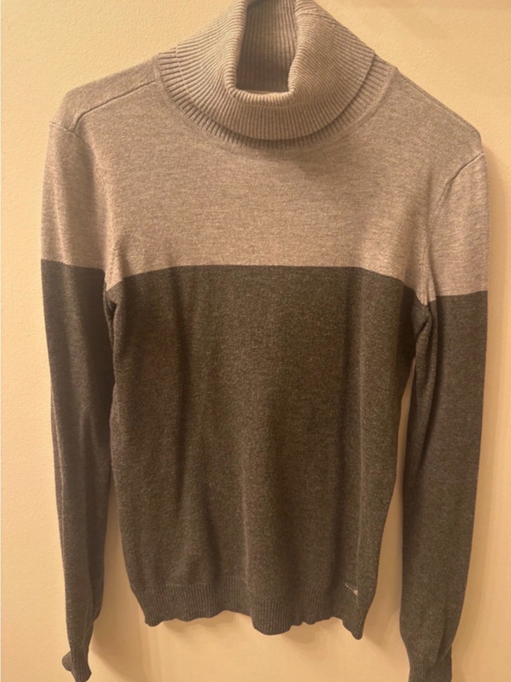Woman’s Two-Tone Gray Turtleneck Sweater